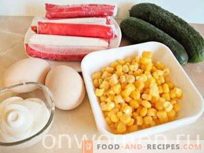 Crab stick salad with corn, eggs and cucumbers